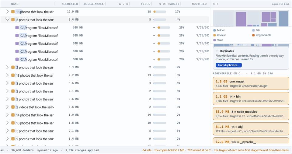 Find similar photos and videos: sets of photos that look the same as rows in the tree, one expanded to its five copies; the status bar counts 84 sets